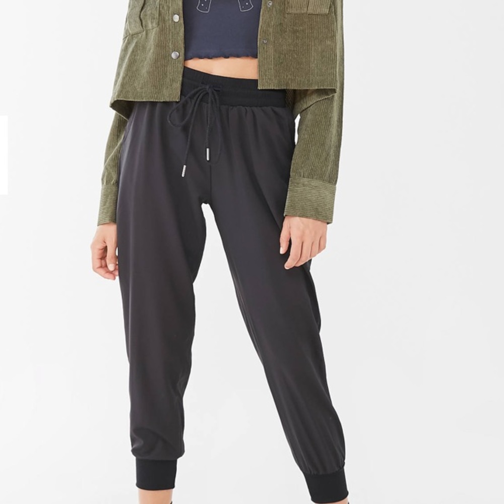 OUT FROM UNDER BLACK JOGGERS